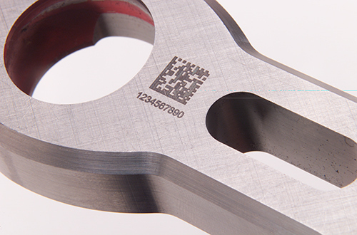 Laser marking serial numbers on tools.