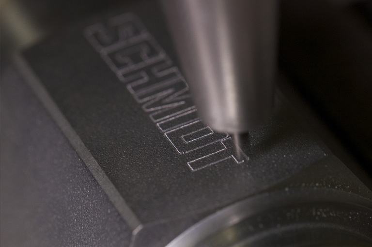 Styliner pin marking machine marking GT SCHMIDT logo